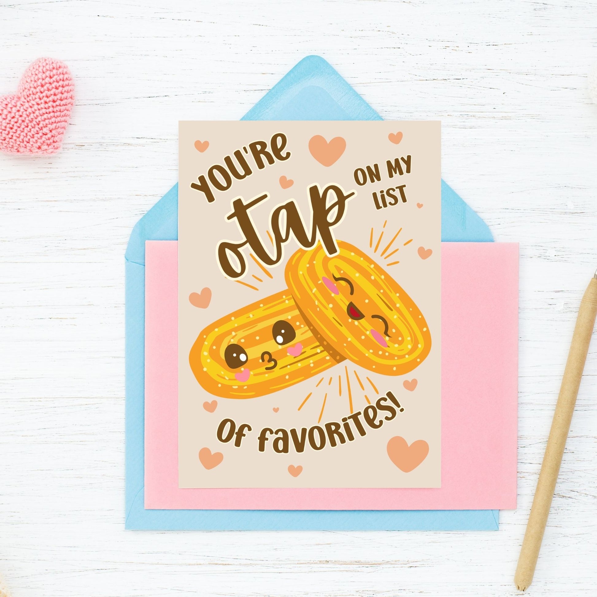 Printable Valentine’s Day card featuring the phrase “You’re Otap on My List of Favorites” with a fun Otap biscuit design. Designed as a 5x7 PDF on an 8.5 x 11 sheet with two cards per page. A punny and heartfelt Valentine’s card for Filipino food lovers.