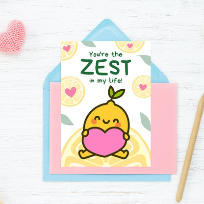 Printable Valentine’s Day Greeting Card featuring the phrase “You’re the Zest in My Life” with a lemon theme. Designed as a 5x7 PDF on an 8.5 x 11 sheet with two cards per page. A fun and punny Valentine’s card for loved ones.