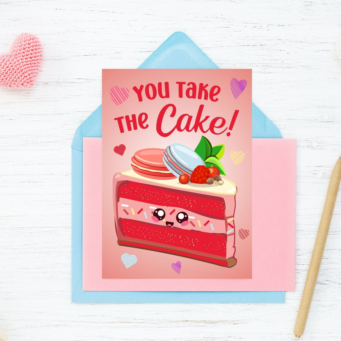 Printable Valentine’s Day card featuring the phrase “You Take the Cake” with a charming dessert design. Designed as a 5x7 PDF on an 8.5 x 11 sheet with two cards per page. A sweet and punny Valentine’s card for loved ones.