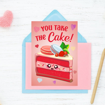 Printable Valentine’s Day card featuring the phrase “You Take the Cake” with a charming dessert design. Designed as a 5x7 PDF on an 8.5 x 11 sheet with two cards per page. A sweet and punny Valentine’s card for loved ones.