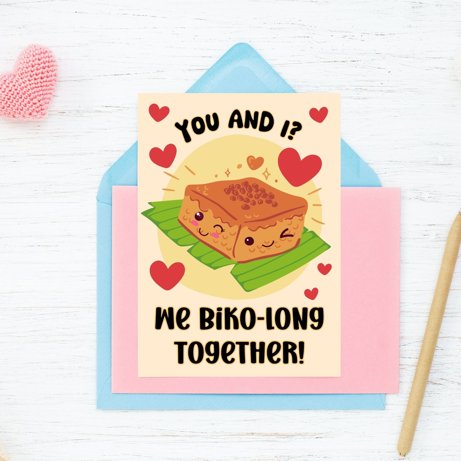 Printable Valentine’s Day card featuring the phrase “You and I, We Biko-long Together” with a Filipino Biko-inspired design. Designed as a 5x7 PDF on an 8.5 x 11 sheet with two cards per page. A punny and heartfelt Valentine’s card for Filipino food lovers.