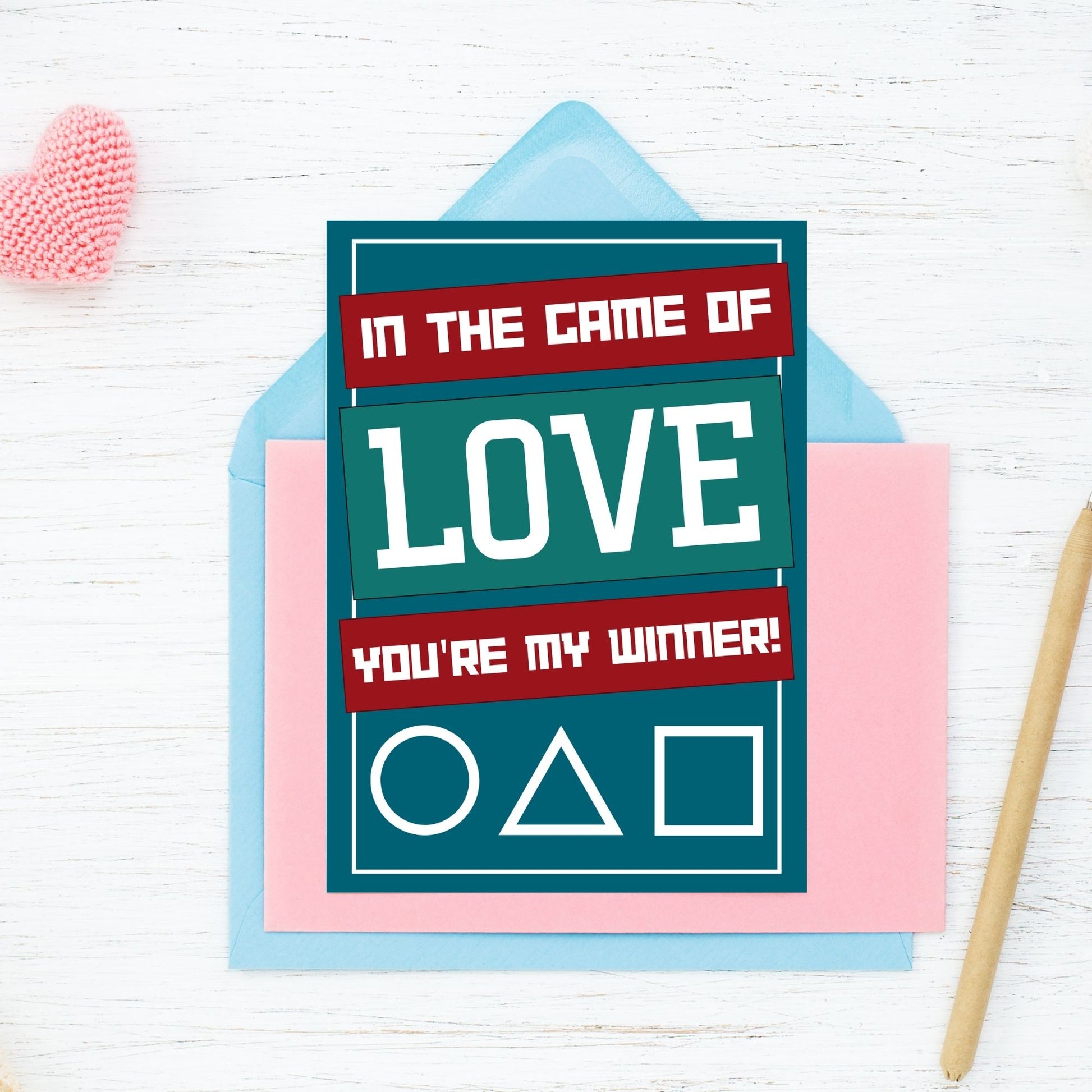 A Squid Game-inspired printable Valentine's Day card featuring bold graphics and a playful love message. Perfect for fans of the show who want a fun and unique Valentine’s card.