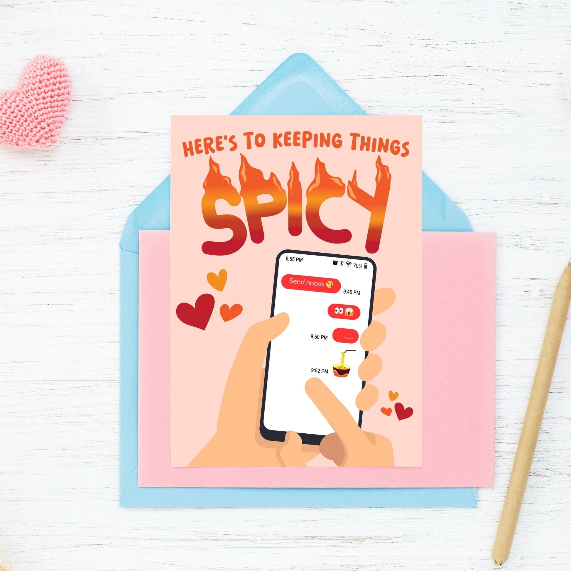 Printable Valentine’s Day Greeting Card featuring the flirty message “Here's to Keeping Things Spicy.” Designed as a 5x7 PDF on an 8.5 x 11 sheet with two cards per page. A fun and cheeky Valentine’s card for couples.