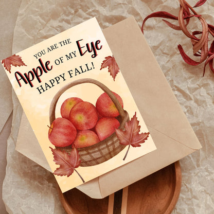 Printable Fall Greeting Card featuring a charming apple theme with the message 'You Are the Apple of My Eye,' perfect for sending warm autumn greetings.