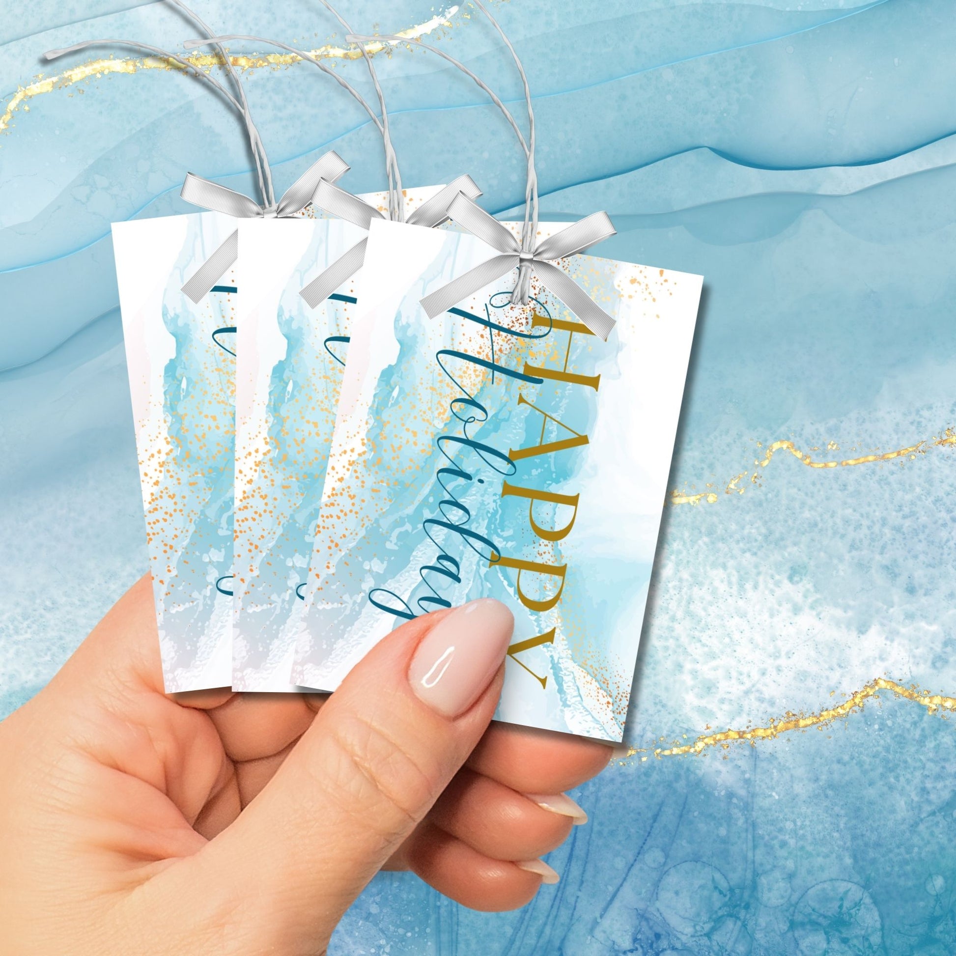 Blue and gold marble Holiday gift tags featuring a luxurious design with gold accents and elegant "Happy Holidays" text, sized 2.5 x 3.5 inches, 8 per sheet.