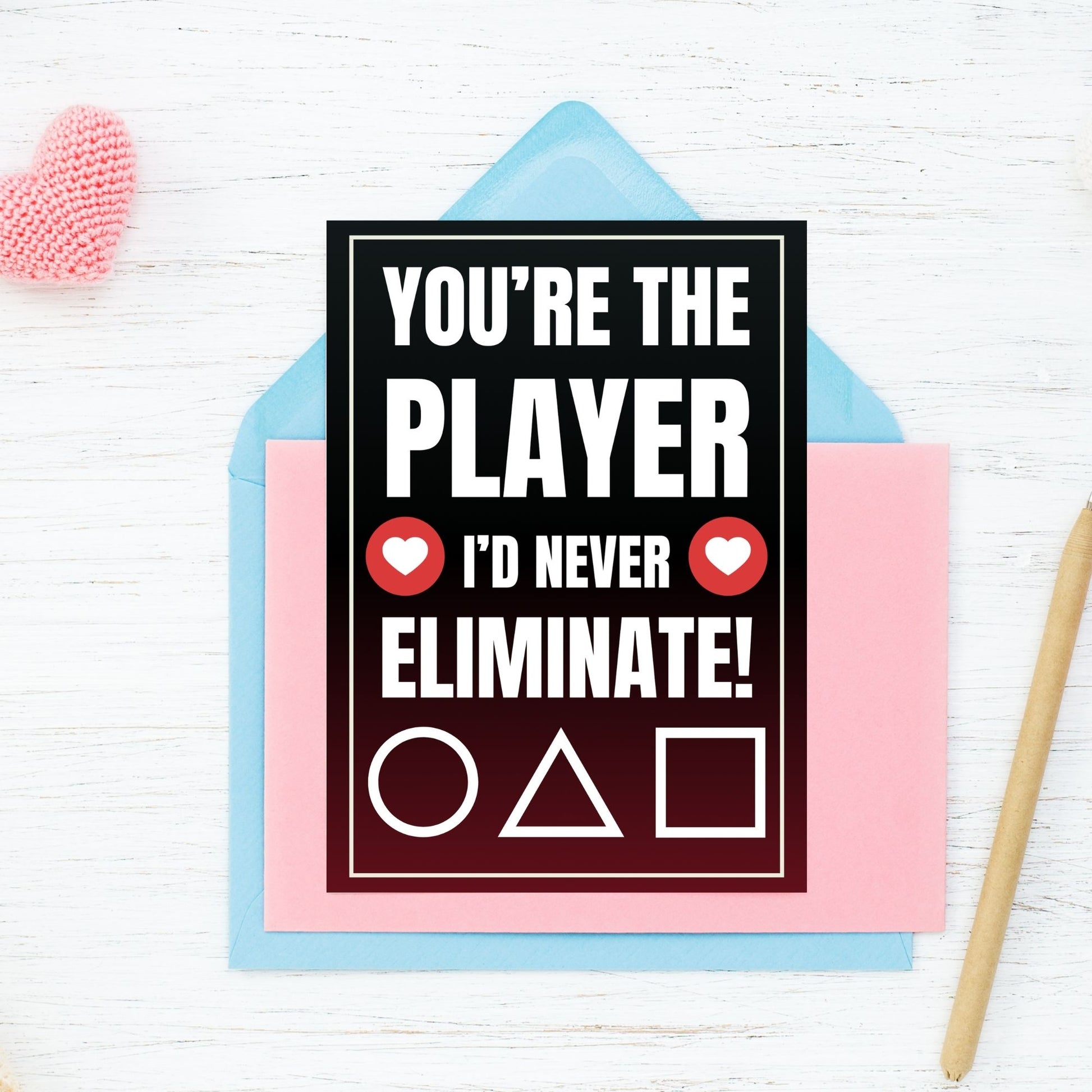 Squid Game-inspired Valentine’s Day card with a player selection theme, perfect for fans. Features bold red, black, and white colors with a playful elimination message.
