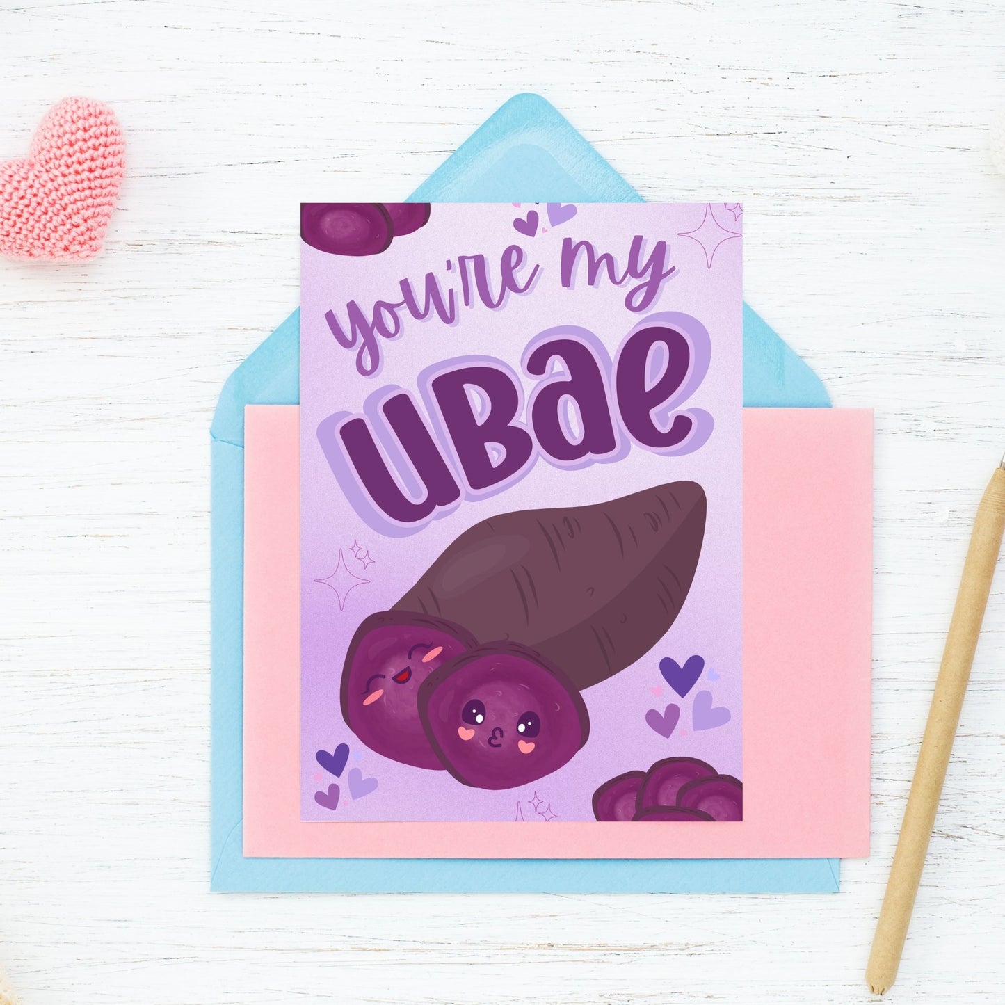 Printable Valentine’s Day card featuring the phrase “You’re My UBAE” with a cute and colorful ube-themed design. Designed as a 5x7 PDF on an 8.5 x 11 sheet with two cards per page. A punny and heartfelt Valentine’s card for ube lovers.