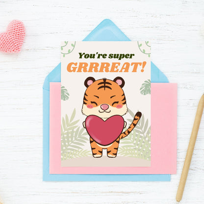 Printable Valentine’s Day Greeting Card featuring the phrase “You're Super GRRREAT” with a tiger theme. Designed as a 5x7 PDF on an 8.5 x 11 sheet with two cards per page. A fun and fierce Valentine’s card for animal lovers.