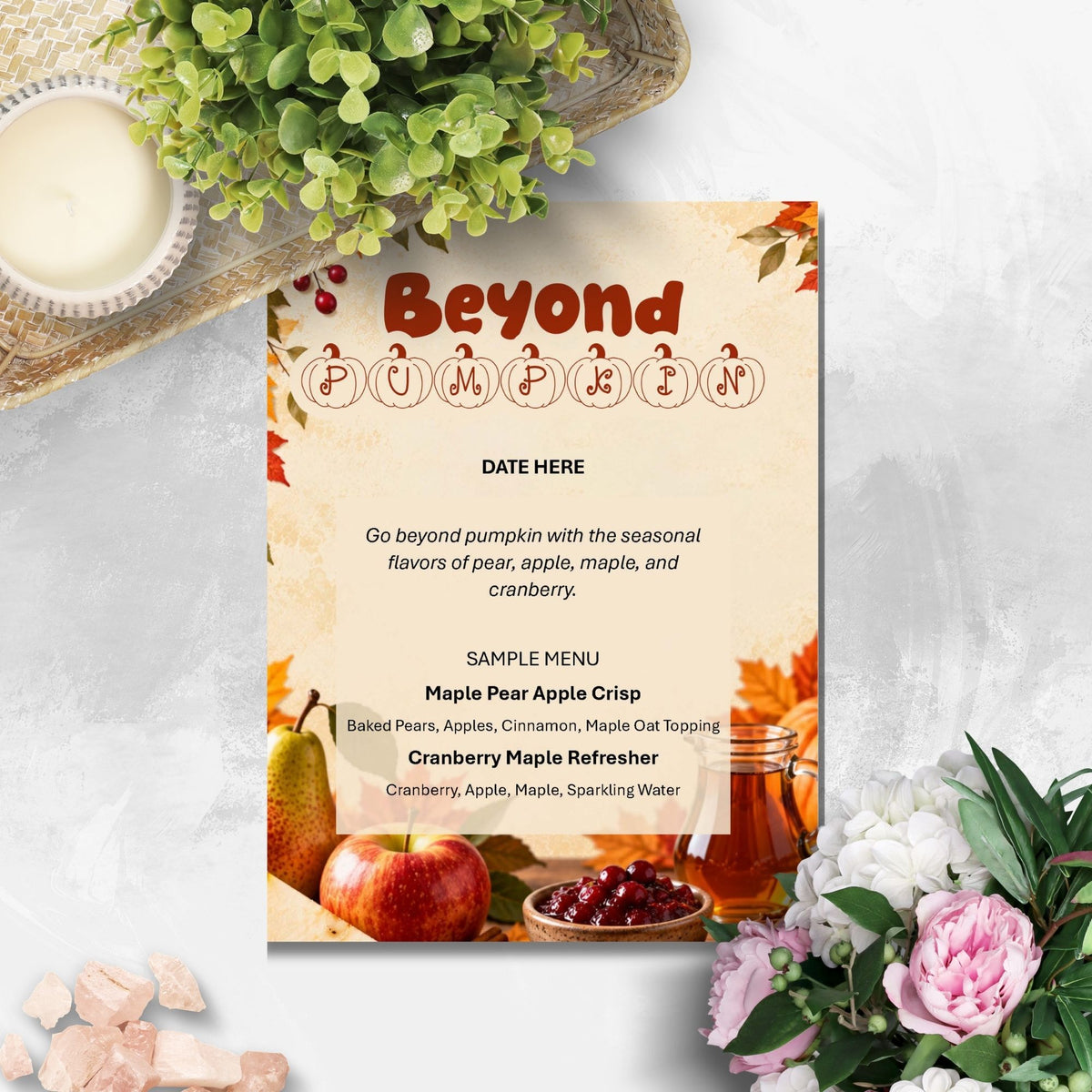 A printed menu card styled on a light marble surface with autumn-themed props including a candle, greenery, and flowers. The card has the heading 'Beyond Pumpkin' and sample menu text with fall illustrations.