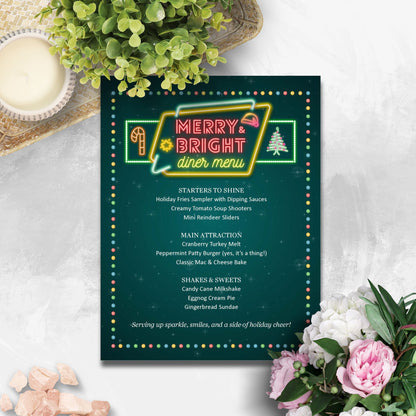 Neon-style diner menu with Christmas-themed design on a white surface with flowers and a candle.