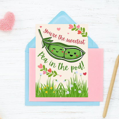 Printable Valentine’s Day Greeting Card featuring the phrase “You’re the Sweetest Pea in the Pod” with a cute pea pod design. Designed as a 5x7 PDF on an 8.5 x 11 sheet with two cards per page. A sweet and punny Valentine’s card for loved ones.