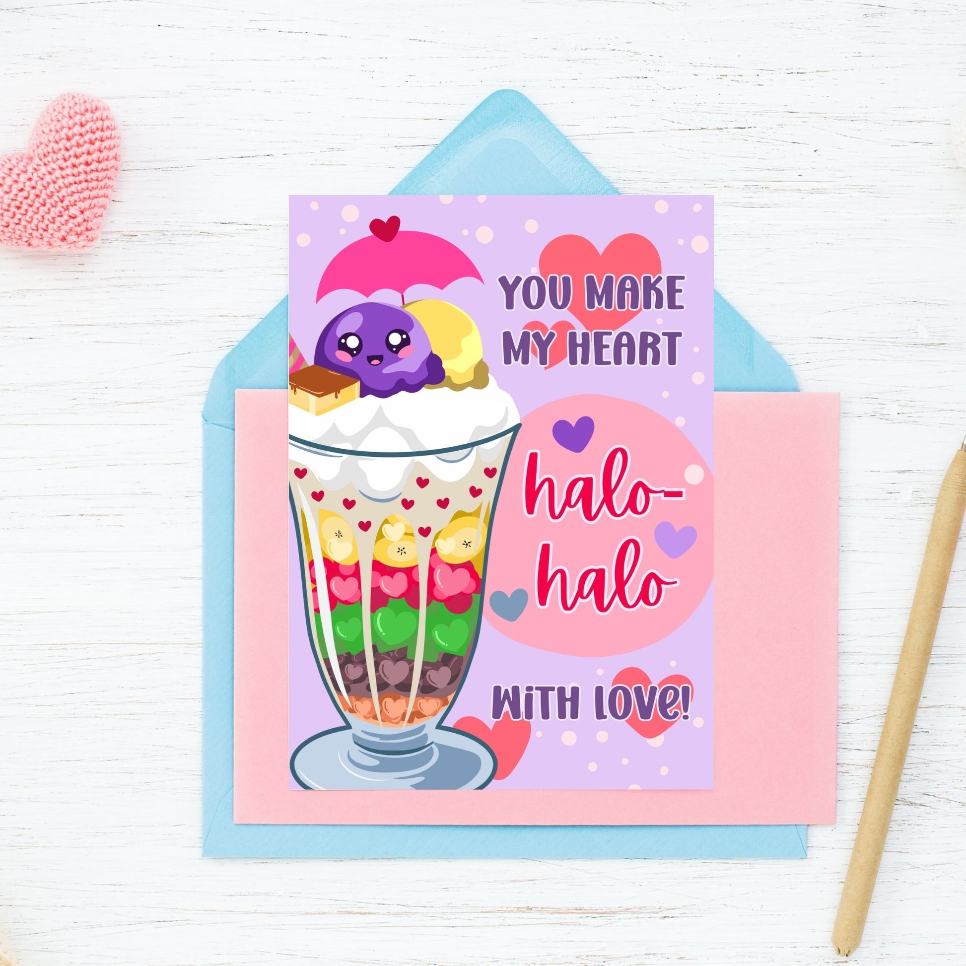 Printable Valentine’s Day card featuring the phrase “You Make My Heart Halo-Halo with Love” with an illustration of the Filipino dessert halo-halo. Designed as a 5x7 PDF on an 8.5 x 11 sheet with two cards per page. A punny and culturally inspired Valentine’s card for food lovers.