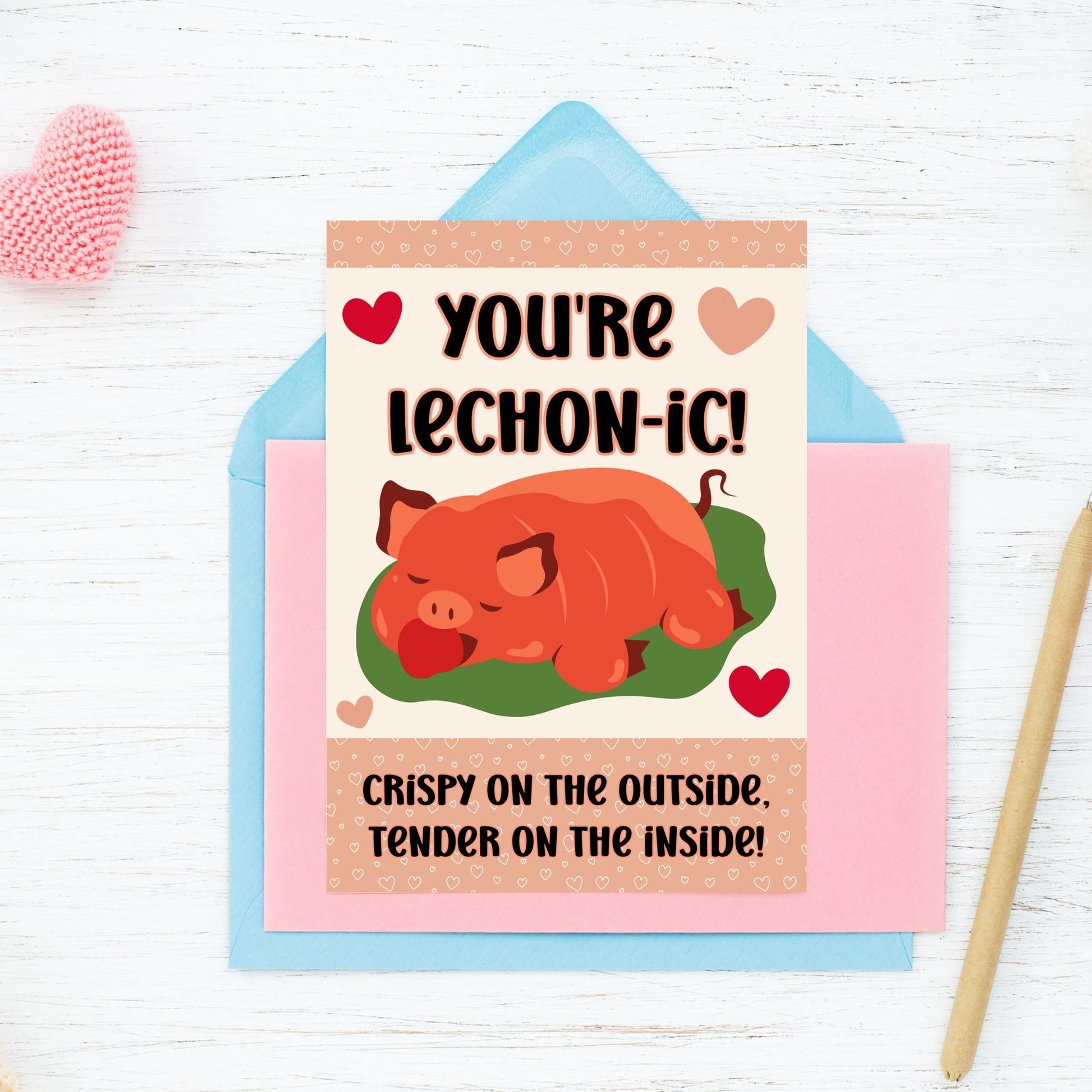 Printable Valentine’s Day card featuring the phrase “You’re Lechonic” with a Lechon-inspired design. Designed as a 5x7 PDF on an 8.5 x 11 sheet with two cards per page. A punny and heartfelt Valentine’s card for Filipino food lovers.