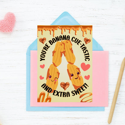 Printable Valentine’s Day card featuring the phrase “You're Bananacuetastic” with a Filipino Banana Cue-inspired design. Designed as a 5x7 PDF on an 8.5 x 11 sheet with two cards per page. A punny and heartfelt Valentine’s card for Filipino food lovers.