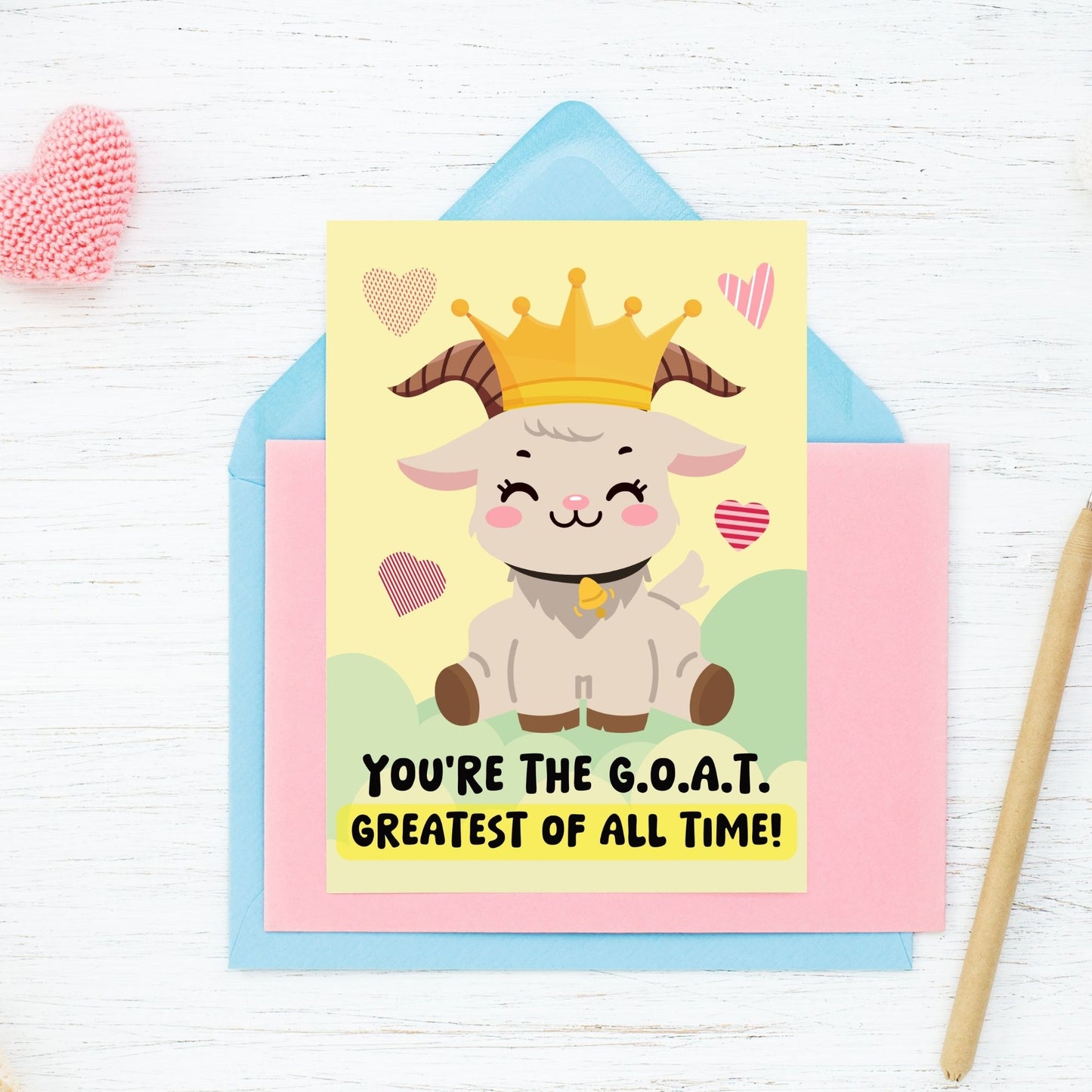 Printable Valentine’s Day Greeting Card featuring the phrase “You’re The GOAT” with a goat design. Designed as a 5x7 PDF on an 8.5 x 11 sheet with two cards per page. A fun and heartfelt Valentine’s card for loved ones.