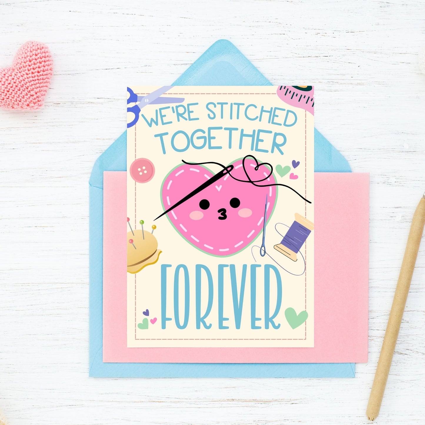 Printable Valentine’s Day Greeting Card featuring the phrase “We're Stitched Together Forever.” Designed as a 5x7 PDF on an 8.5 x 11 sheet with two cards per page. A heartfelt and meaningful Valentine’s card for couples and best friends.