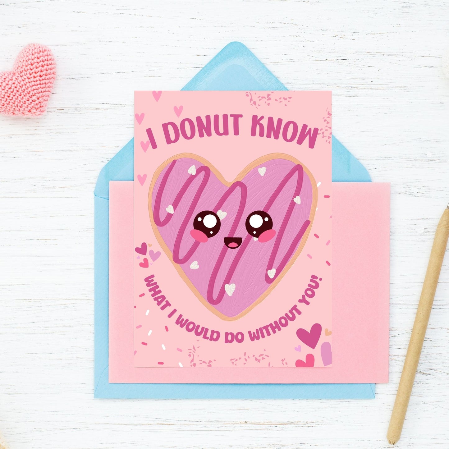 Printable Valentine’s Day card featuring the phrase “I Donut Know What I Would Do Without You” with a fun donut design. Designed as a 5x7 PDF on an 8.5 x 11 sheet with two cards per page. A punny and sweet Valentine’s card for loved ones.