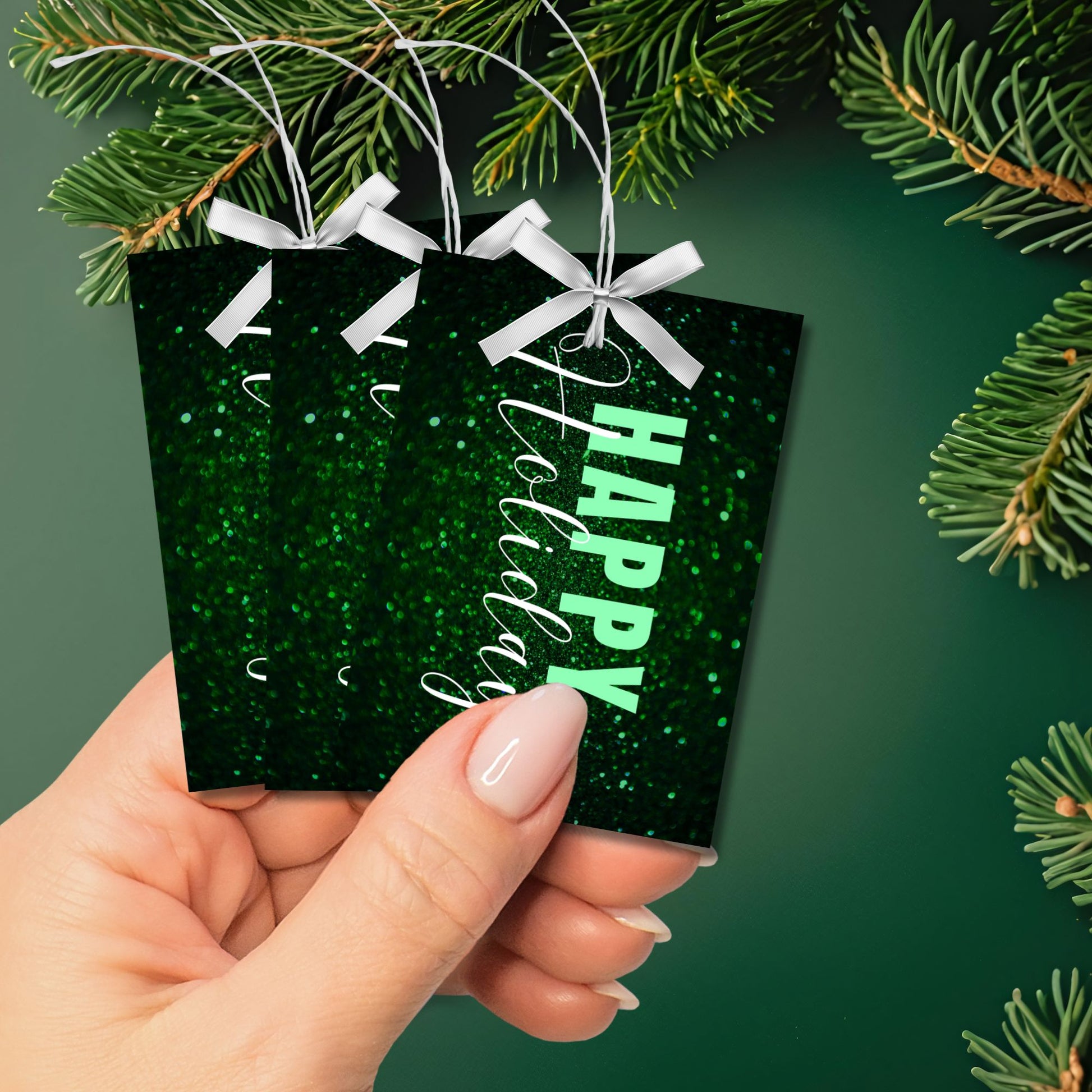 Green-themed ready-to-print Holiday gift tags featuring a glittery green background with elegant "Happy Holidays" text, 2.5 x 3.5 inches, 8 per 8.5 x 11-inch sheet.