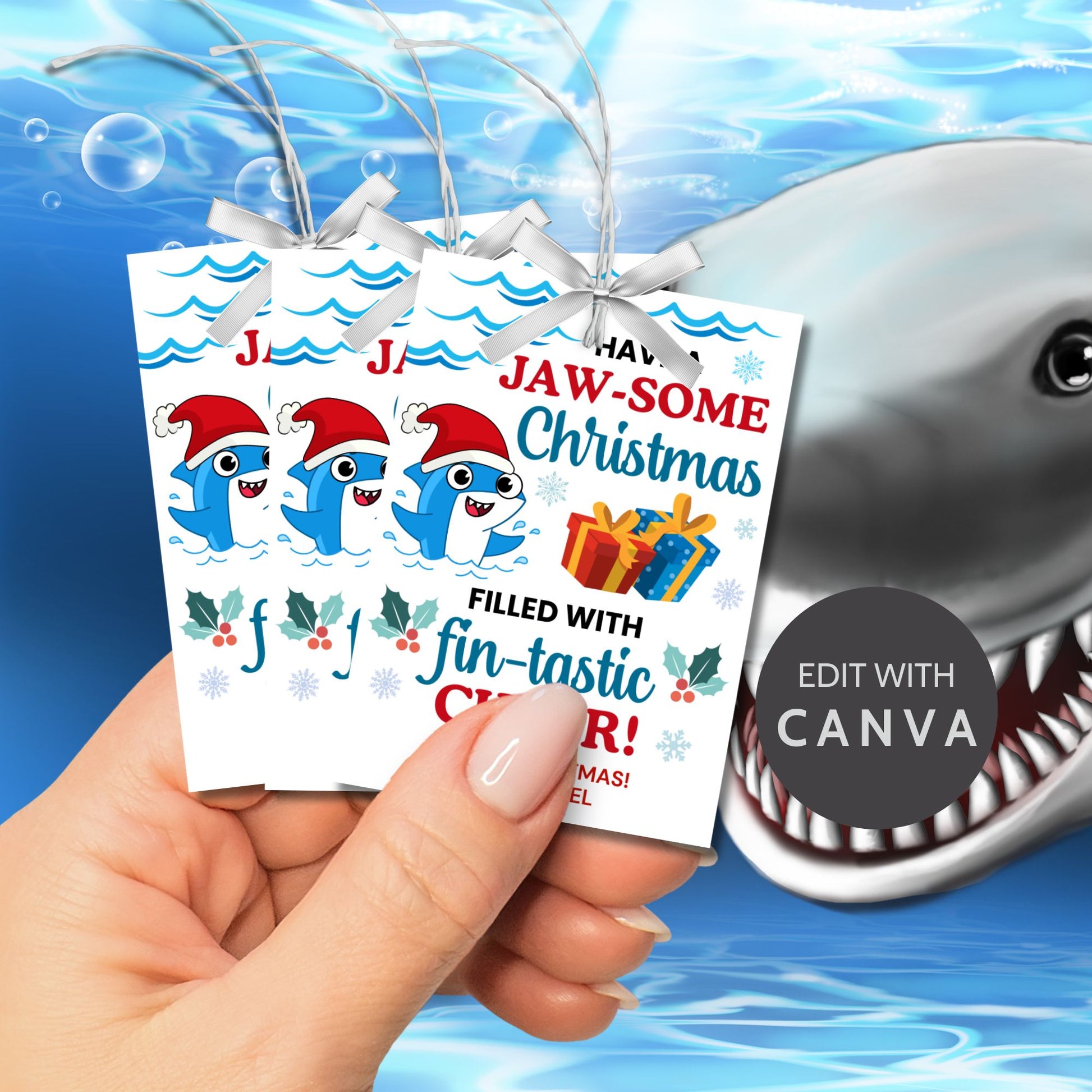 Festive shark-themed holiday gift tags featuring a smiling shark wearing a Santa hat, surrounded by waves, holly, and presents, with the message 'Have a JAW-some Christmas filled with fin-tastic cheer!' Perfect for personalized Christmas gifts.