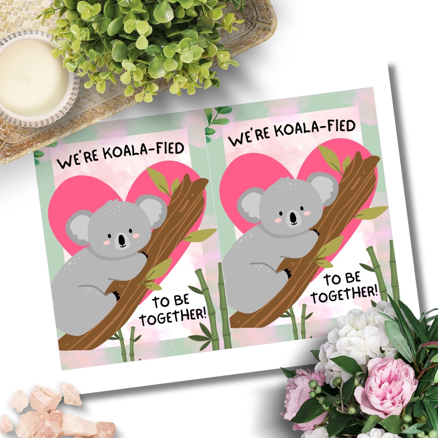 Printable Valentine’s Day Greeting Card featuring the phrase “We’re Koalafied to Be Together” with a koala design. Designed as a 5x7 PDF on an 8.5 x 11 sheet with two cards per page. A cute and punny Valentine’s card for loved ones.