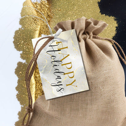 Luxury Holiday gift tags featuring a marble background with gold accents and black "Happy Holidays" typography, sized 2.5 x 3.5 inches, 8 tags per sheet.