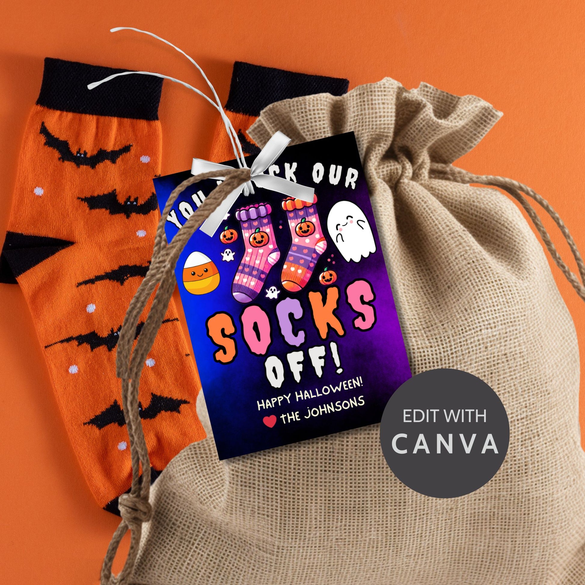 Halloween-themed printable gift tags with the message "You Knock Our Socks Off!" featuring colorful Halloween socks, ghosts, and candy corn. Tags are 2.5 x 3.5 inches, laid out 8 per sheet on a standard 8.5 x 11-inch page. Includes a printable PDF and a PDF with a link to an editable Canva template.