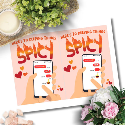 Printable Valentine’s Day Greeting Card featuring the flirty message “Here's to Keeping Things Spicy.” Designed as a 5x7 PDF on an 8.5 x 11 sheet with two cards per page. A fun and cheeky Valentine’s card for couples.