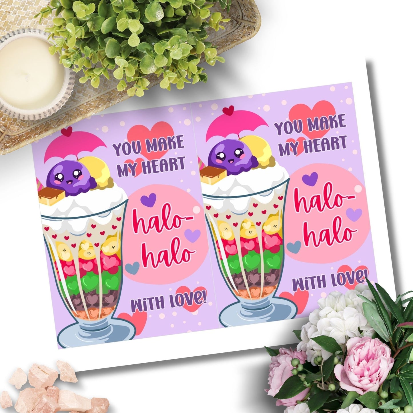 Printable Valentine’s Day card featuring the phrase “You Make My Heart Halo-Halo with Love” with an illustration of the Filipino dessert halo-halo. Designed as a 5x7 PDF on an 8.5 x 11 sheet with two cards per page. A punny and culturally inspired Valentine’s card for food lovers.