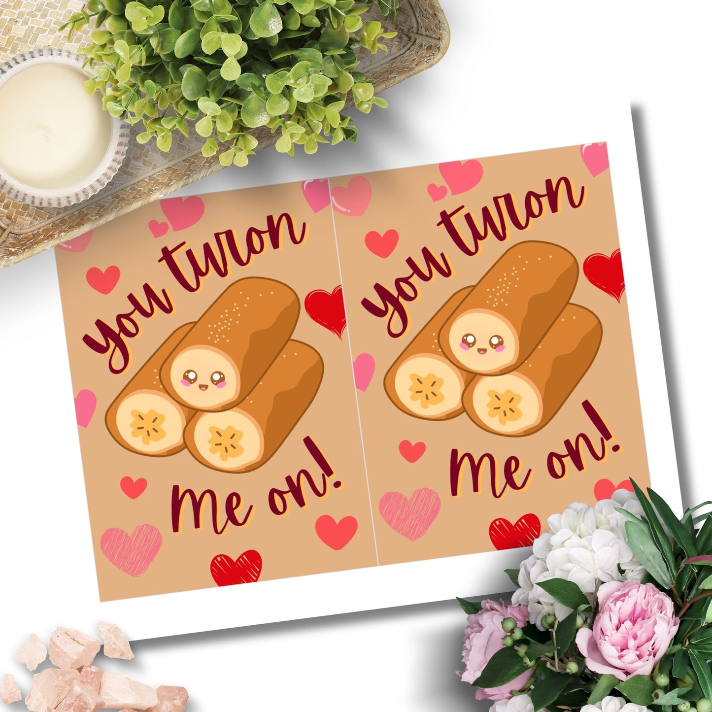 Printable Valentine’s Day card featuring the phrase “You Turon Me On” with an illustration of the Filipino dessert turon. Designed as a 5x7 PDF on an 8.5 x 11 sheet with two cards per page. A punny and culturally inspired Valentine’s card for food lovers.