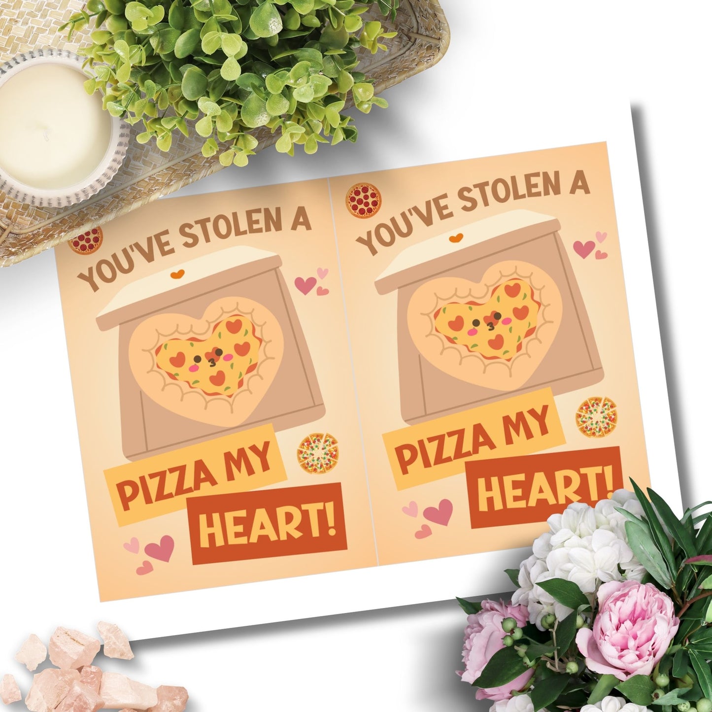 Printable Valentine’s Day Greeting Card featuring the phrase “You’ve Stolen a Pizza My Heart” with a pizza theme. Designed as a 5x7 PDF on an 8.5 x 11 sheet with two cards per page. A fun and punny Valentine’s card for pizza lovers.