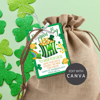 A fun and punny St. Patrick’s Day printable gift tag featuring a striped popcorn bucket decorated with shamrocks, gold coins, and a leprechaun hat. The tag reads "Just Poppin’ By to Wish You Luck! Hope Your Day is Golden—No Need for a Buck!" The tags are 2.5 x 3.5 inches, laid out on an 8.5 x 11-inch sheet, 8 per page. Available as a printable PDF and an editable Canva template for personalization.