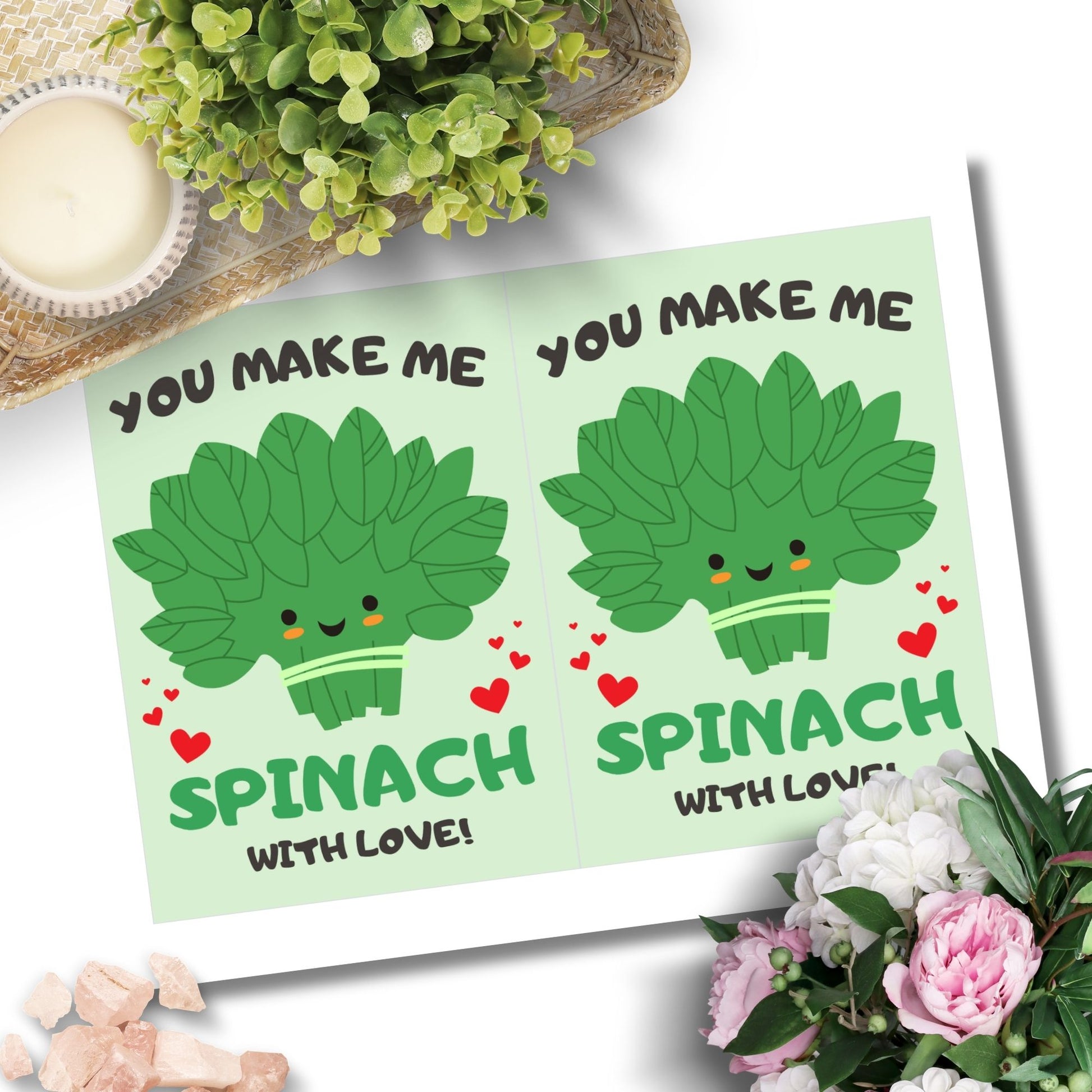 Printable Valentine’s Day Greeting Card featuring the phrase “You Make Me Spinach with Love” with a fun spinach design. Designed as a 5x7 PDF on an 8.5 x 11 sheet with two cards per page. A punny and fresh Valentine’s card for loved ones.