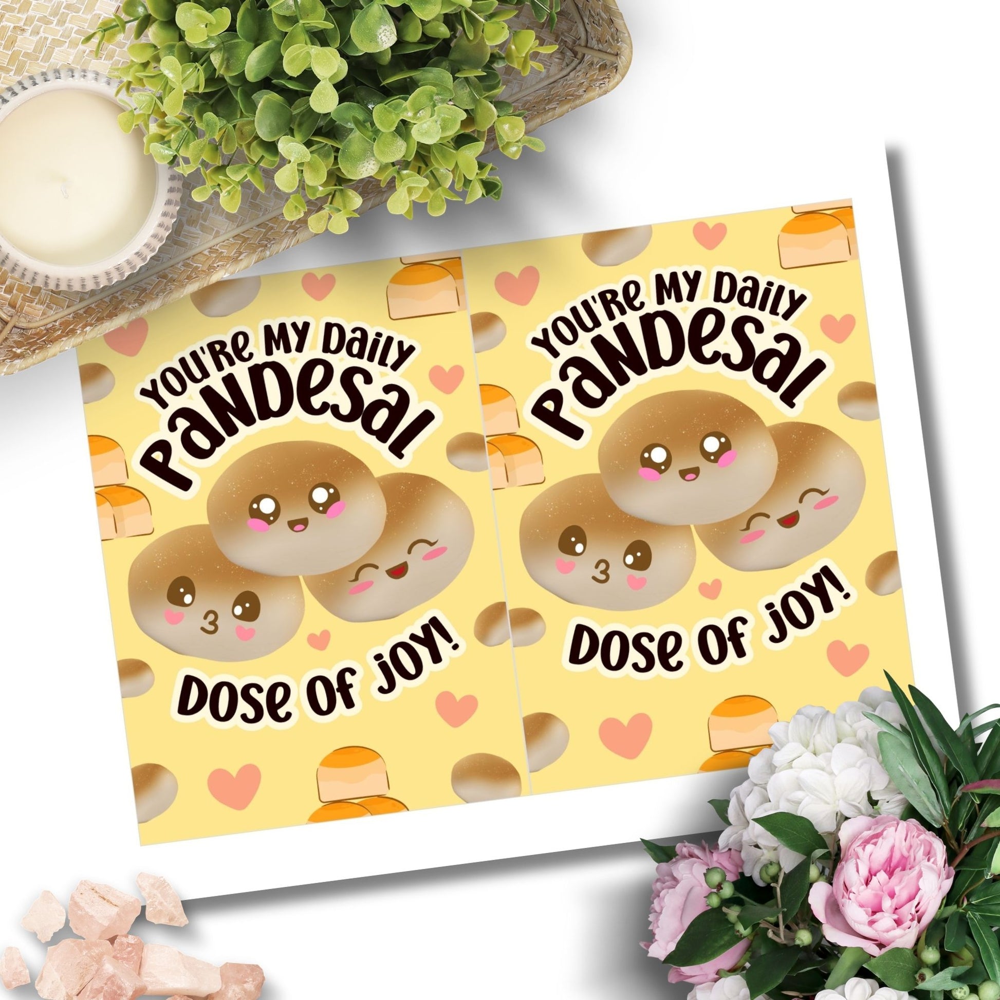 Printable Valentine’s Day card featuring the phrase “You’re My Daily Pandesal Dose of Joy” with a cute and warm pandesal design. Designed as a 5x7 PDF on an 8.5 x 11 sheet with two cards per page. A punny and heartfelt Valentine’s card for Filipino food lovers.