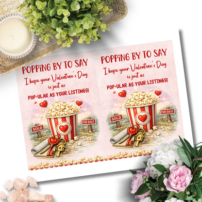Printable popcorn Valentine’s Day card for realtors featuring a popcorn bucket, real estate signs, keys, and the phrase “Pop-ular as Your Listings,” designed as a client appreciation gift.