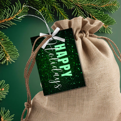 Green-themed ready-to-print Holiday gift tags featuring a glittery green background with elegant "Happy Holidays" text, 2.5 x 3.5 inches, 8 per 8.5 x 11-inch sheet.