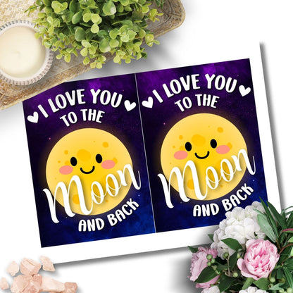 Printable Valentine’s Day Greeting Card featuring the message “I Love You to the Moon and Back.” Designed as a 5x7 PDF on an 8.5 x 11 sheet with two cards per page. A romantic and heartfelt Valentine’s card.