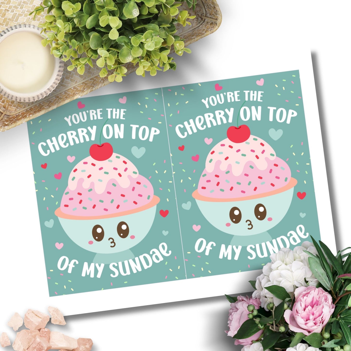 Printable Valentine’s Day card featuring the phrase “You’re the Cherry on Top of My Sundae” with a cute ice cream sundae design. Designed as a 5x7 PDF on an 8.5 x 11 sheet with two cards per page. A punny and heartfelt Valentine’s card for loved ones.