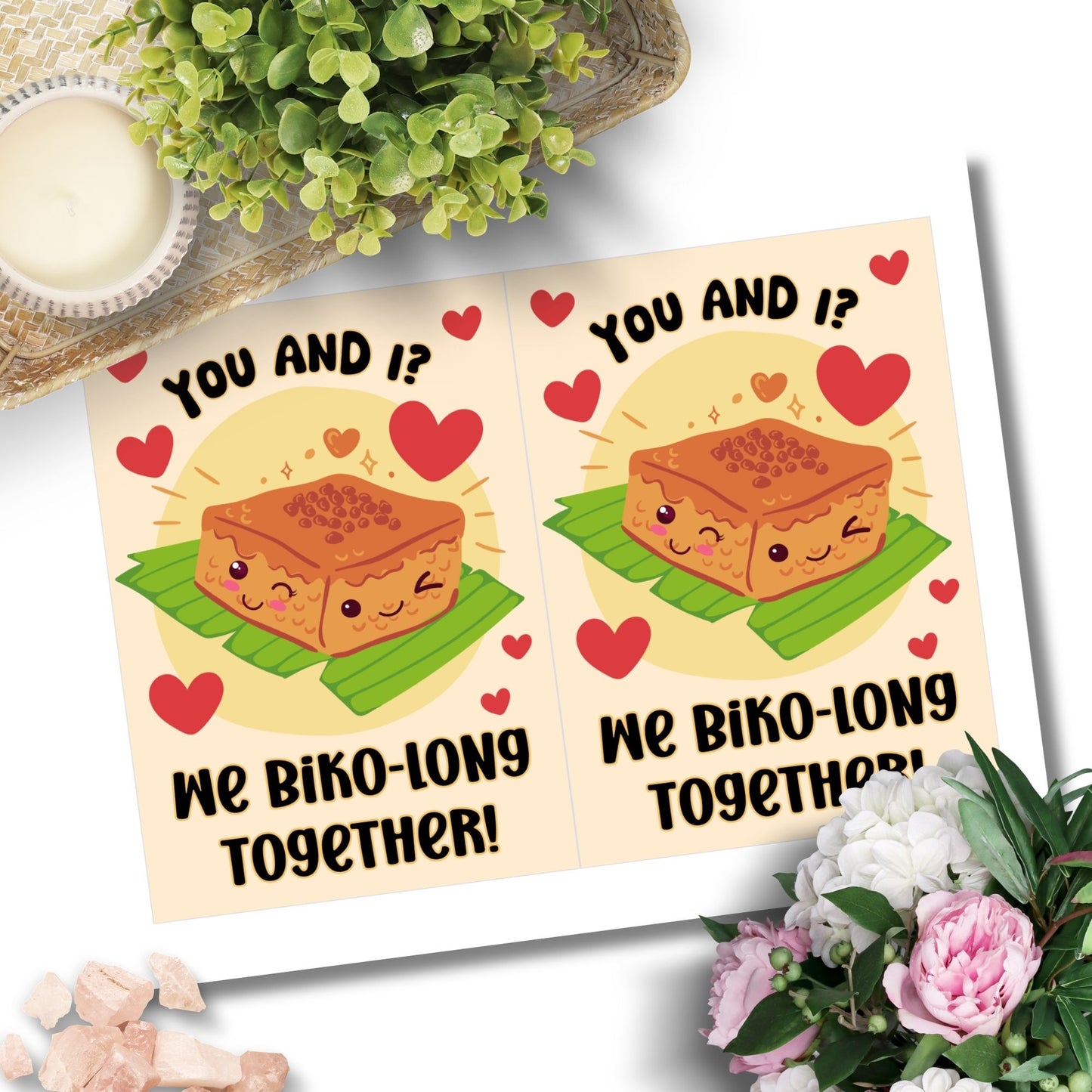 Printable Valentine’s Day card featuring the phrase “You and I, We Biko-long Together” with a Filipino Biko-inspired design. Designed as a 5x7 PDF on an 8.5 x 11 sheet with two cards per page. A punny and heartfelt Valentine’s card for Filipino food lovers.