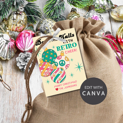 Retro-inspired Christmas gift tags featuring colorful ornaments with peace signs and stripes, paired with the message "Deck the Halls with Retro Cheer!" These printable and editable tags add a cheerful, nostalgic touch to holiday gifts.