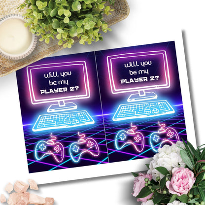 Printable Valentine’s Day Greeting Card with the message “Will You Be My Player 2?” Designed as a 5x7 PDF on an 8.5 x 11 sheet with two cards per page. A fun and geeky Valentine’s card for gamers and couples.