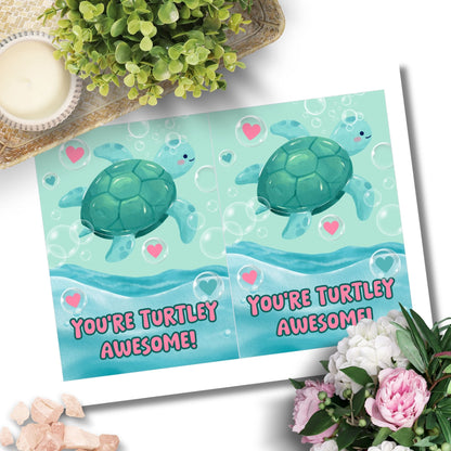 Printable Valentine’s Day Greeting Card featuring the pun “You're Turtley Awesome.” Designed as a 5x7 PDF on an 8.5 x 11 sheet with two cards per page. A cute and fun Valentine’s card for turtle lovers and friends.