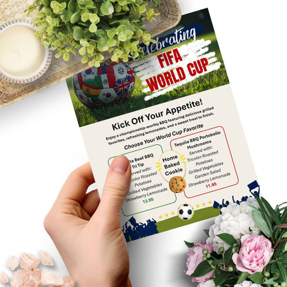 Editable FIFA World Cup-inspired menu template featuring soccer ball graphics, sports-themed design, customizable food menu, printable 8.5x11 Word document for watch parties and events.