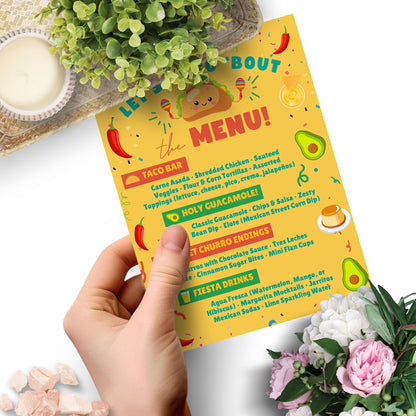 Editable taco-themed party menu with headings like “Taco Bar,” “Holy Guacamole,” and “Sweet Churro Endings.” Bright, colorful Canva template for graduation or fiesta-themed celebrations. Size: 8.5 x 11 inches.
