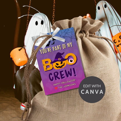 Halloween-themed gift bag with ghost decorations and a personalized tag.