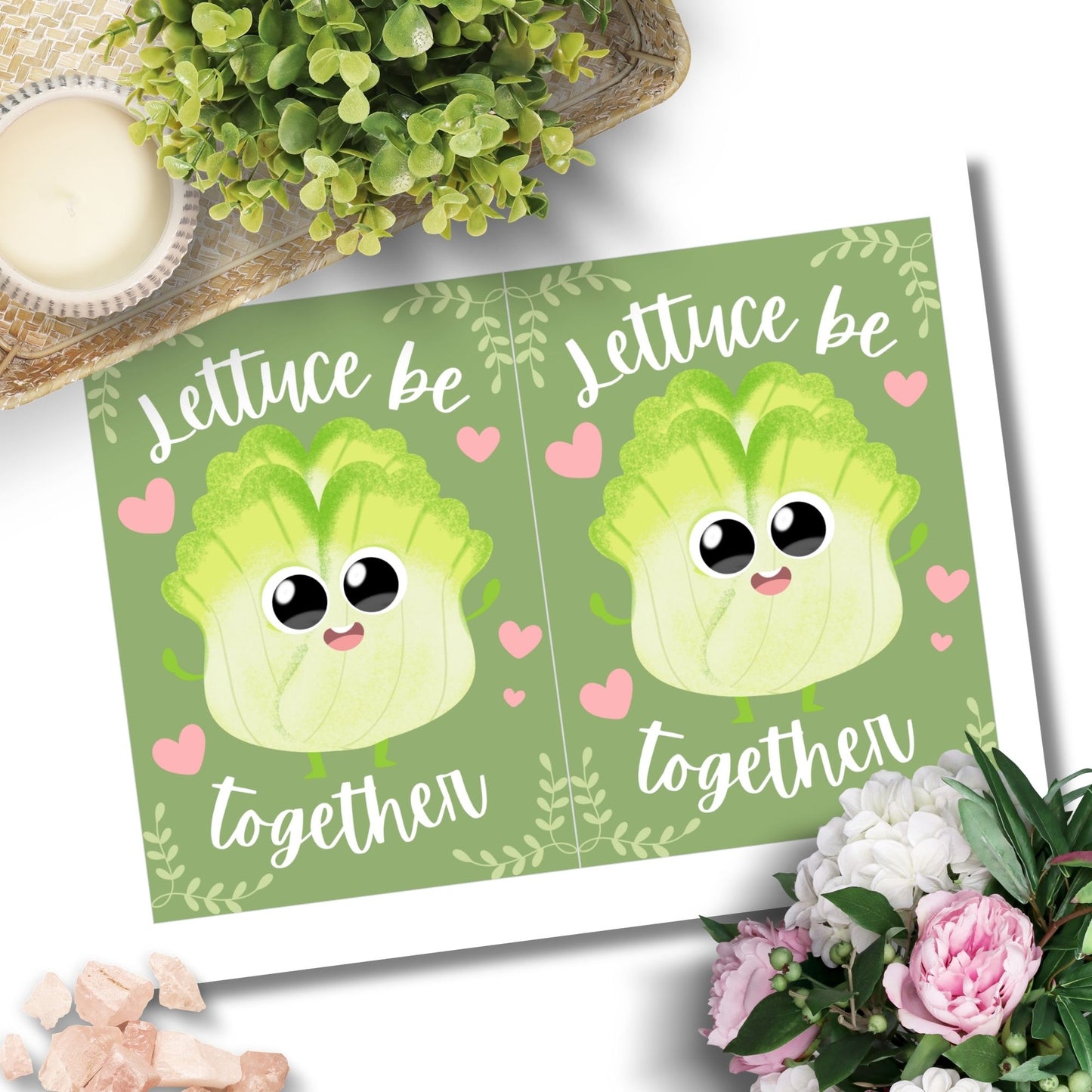 Printable Valentine’s Day Greeting Card featuring the phrase “Lettuce Be Together” with a fun lettuce design. Designed as a 5x7 PDF on an 8.5 x 11 sheet with two cards per page. A punny and fresh Valentine’s card for loved ones.