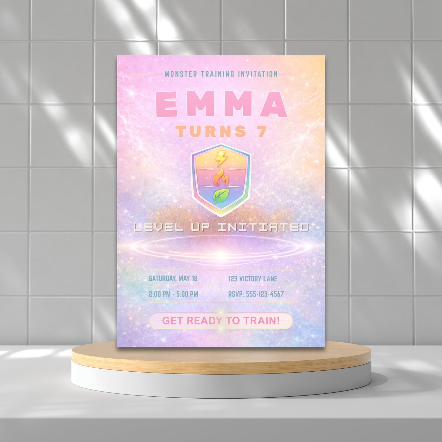 Editable pastel rainbow monster trainer inspired birthday invitation with soft glowing arena, cute badge design, and customizable party details in Canva