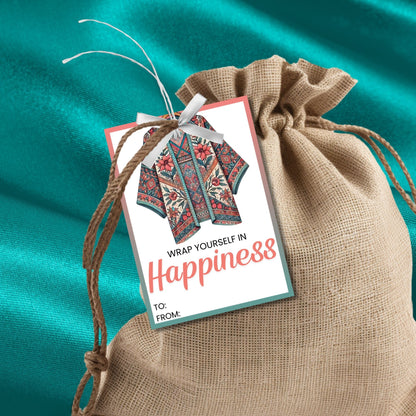 Printable kimono gift tags featuring a colorful kimono design with the text "Wrap Yourself in Happiness" and customizable space for names, perfect for adding a personal touch to any gift.