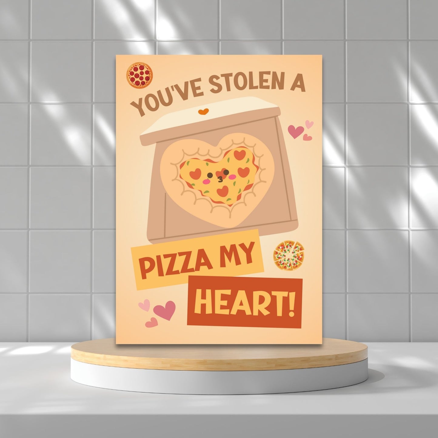 Printable Valentine’s Day Greeting Card featuring the phrase “You’ve Stolen a Pizza My Heart” with a pizza theme. Designed as a 5x7 PDF on an 8.5 x 11 sheet with two cards per page. A fun and punny Valentine’s card for pizza lovers.