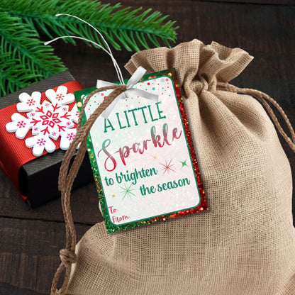 Christmas gift tags featuring the message "A Little Sparkle to Brighten the Season" with festive glitter effects, perfect for jewelry gifts like necklaces, earrings, and rings. These printable and editable tags add an elegant, festive touch to holiday gifts.