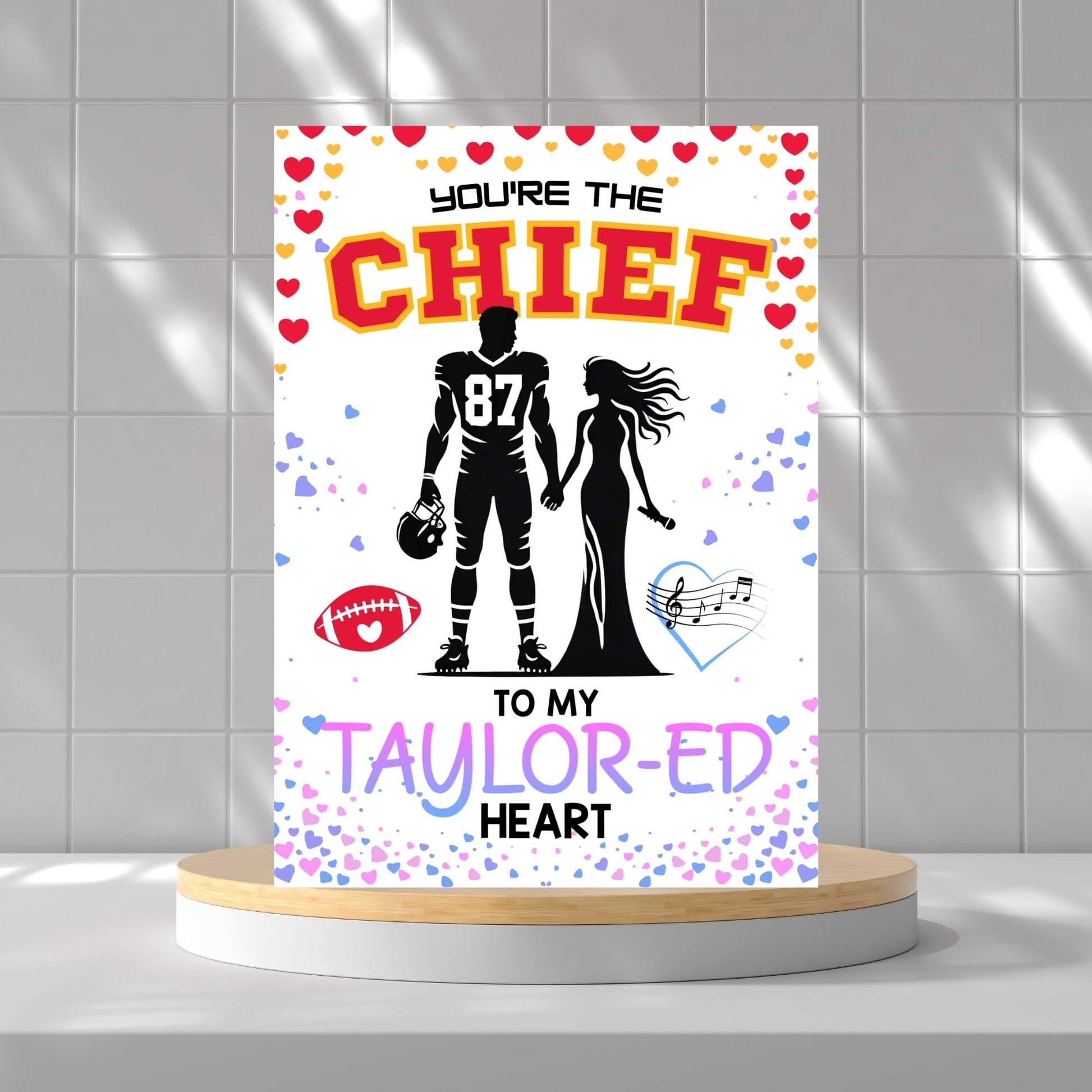 Printable Valentine’s Day card featuring the phrase “You’re the Chief to My Taylored Heart” inspired by Taylor Swift and Travis Kelce. Designed as a 5x7 PDF on an 8.5 x 11 sheet with two cards per page. Perfect for Swifties and football fans!